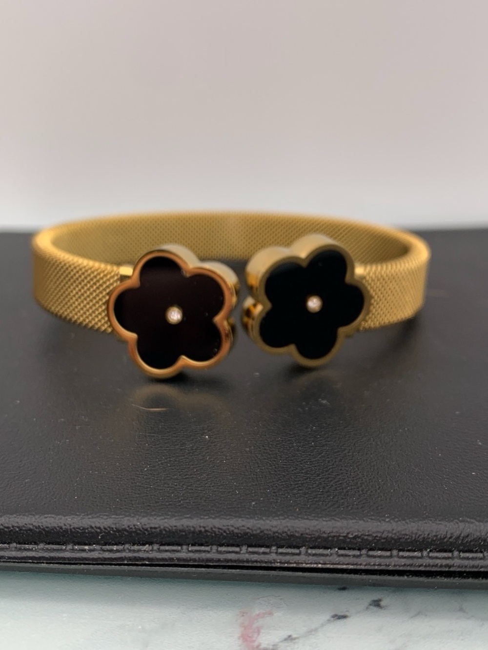 Gold Mesh Bracelet with Black Flower Accents